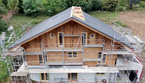 Cladding going on the front of the building