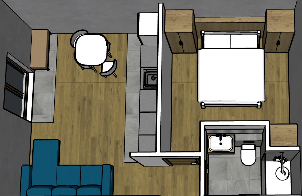 Overhead view of the self-contained apartment: kitchen, dining table, sofa, king bed and en-suite
